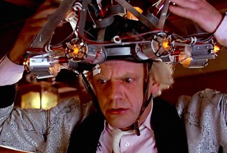 Doc Brown from Back to the Future with a mind reading contraption strapped on his head