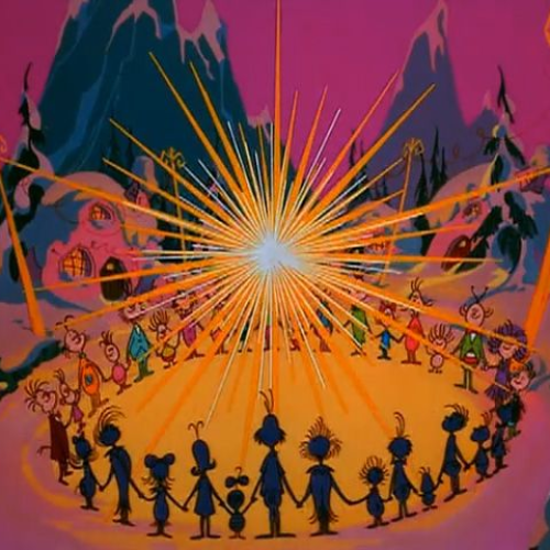 Scene from the cartoon movie "How the Grinch Stole Christmas!" in which the Whos are gathered around the star, singing.